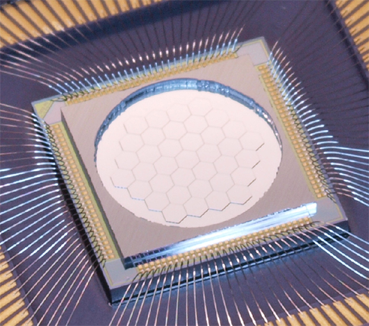 Close-up of the Iris AO 111 Actuator Deformable Mirror (EO stock number #33-267) made of 37 hexagonal segments.